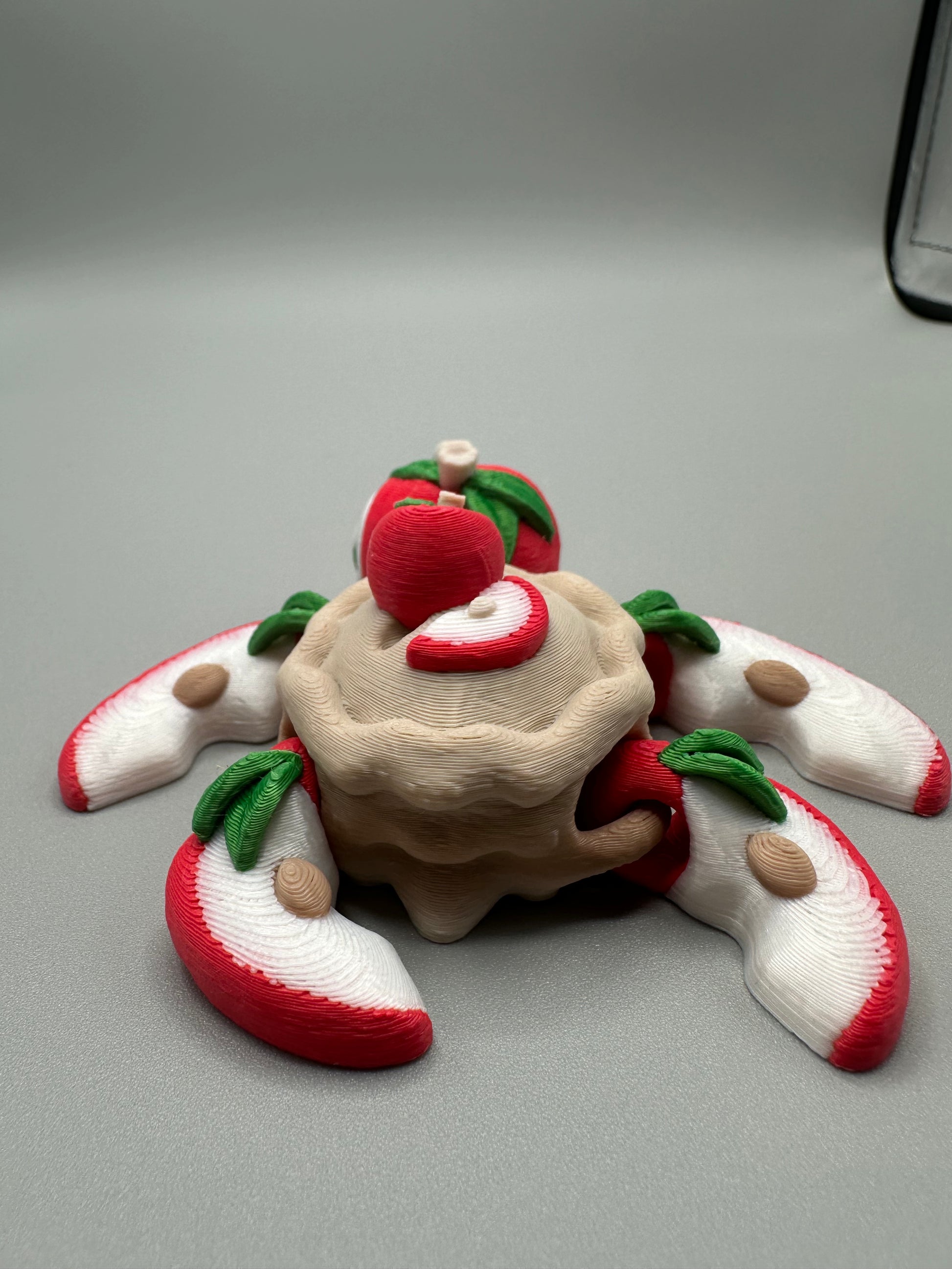 Close-up of 3D printed apple pie design on turtle shell – festive fall collectible
