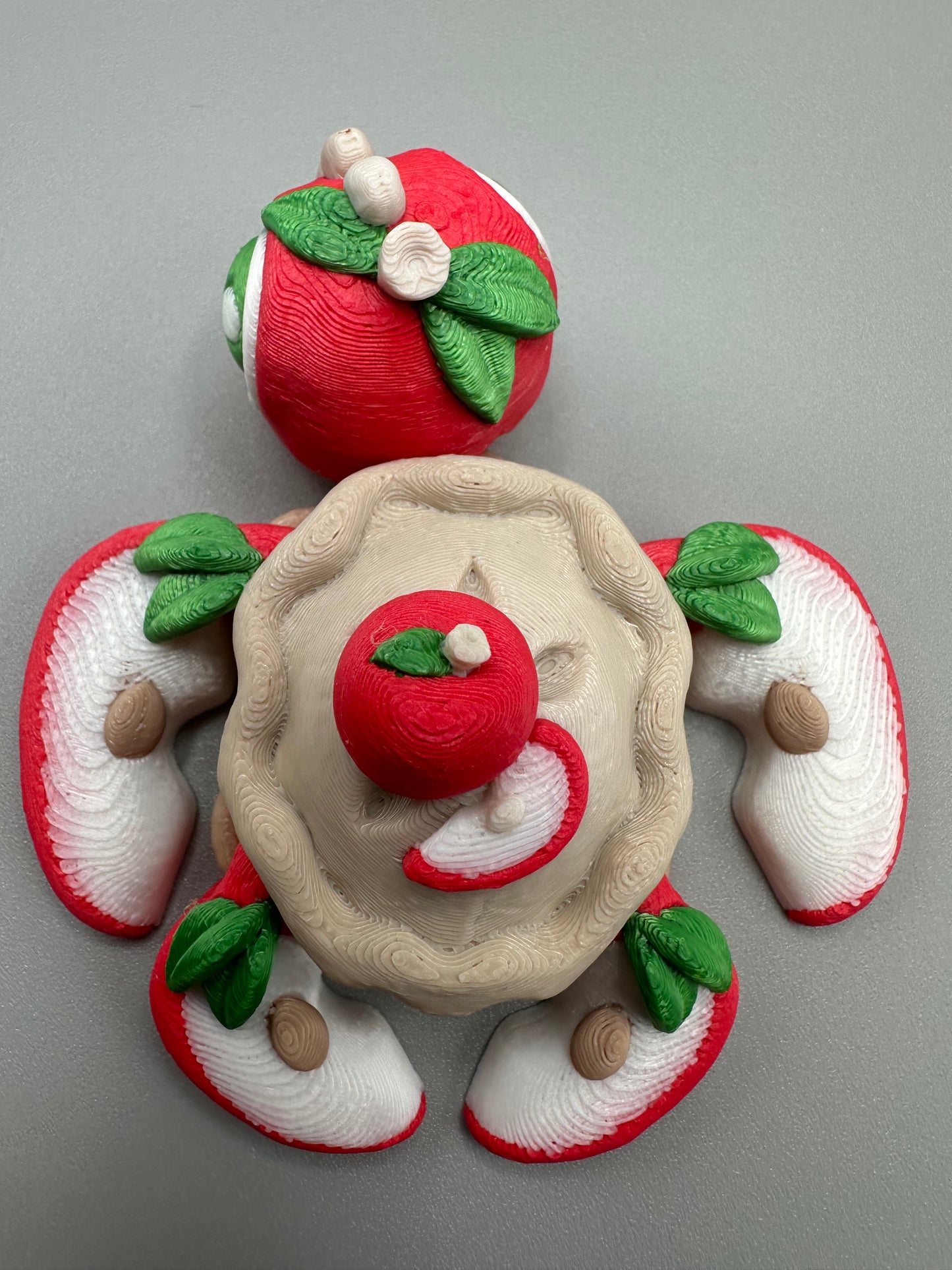 Top-down view of Apple Pie Turtle showing detailed crust texture and red-white apple slices